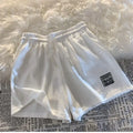 Shorts esportivos femininos confortáveis com textura waffle, ideais para lazer, ciclismo, camping, caminhadas e montanhismo.