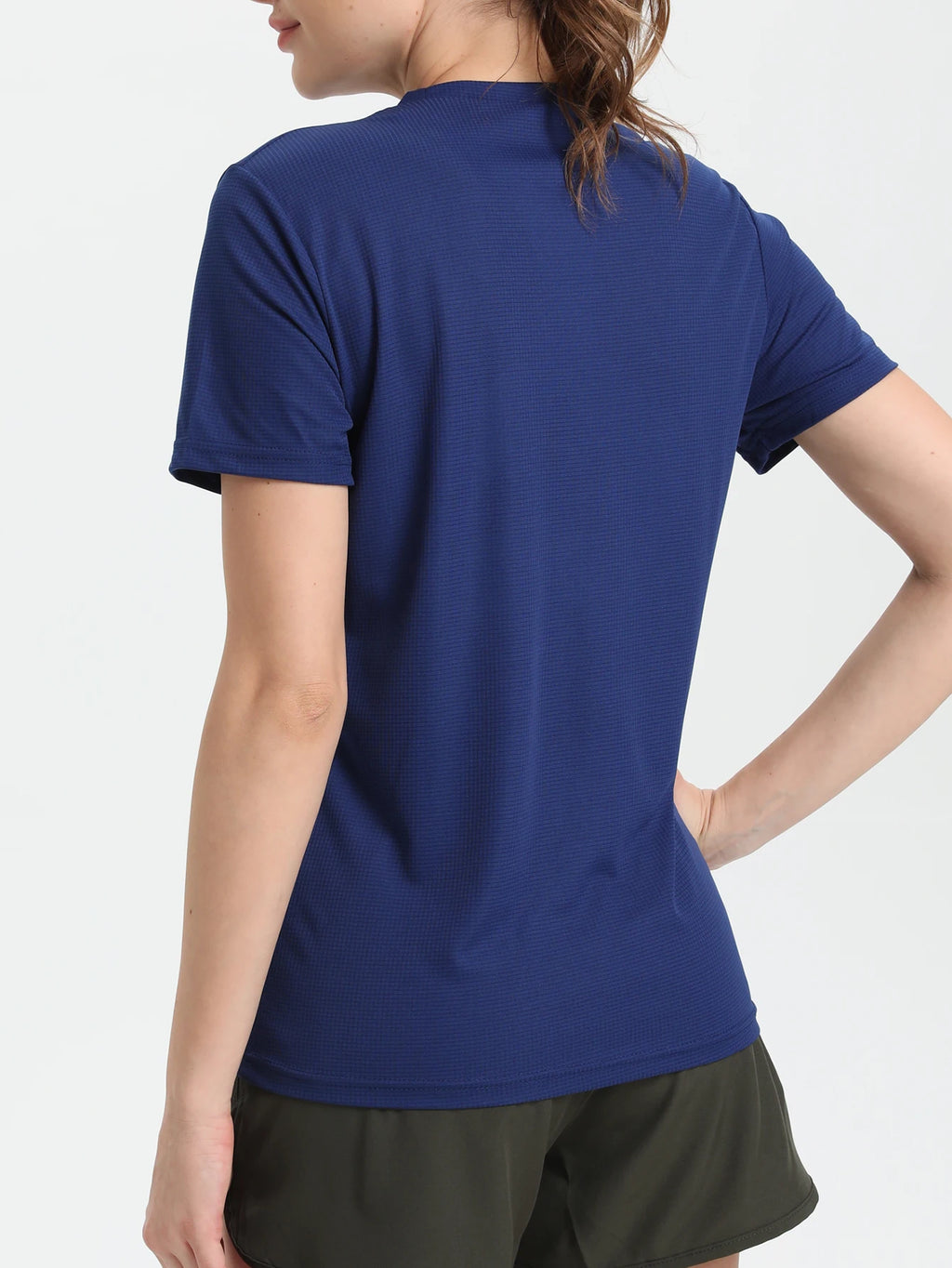 Camiseta esportiva feminina de cor sólida, ultraleve, de secagem rápida, respirável e leve, ideal para corrida e academia.
