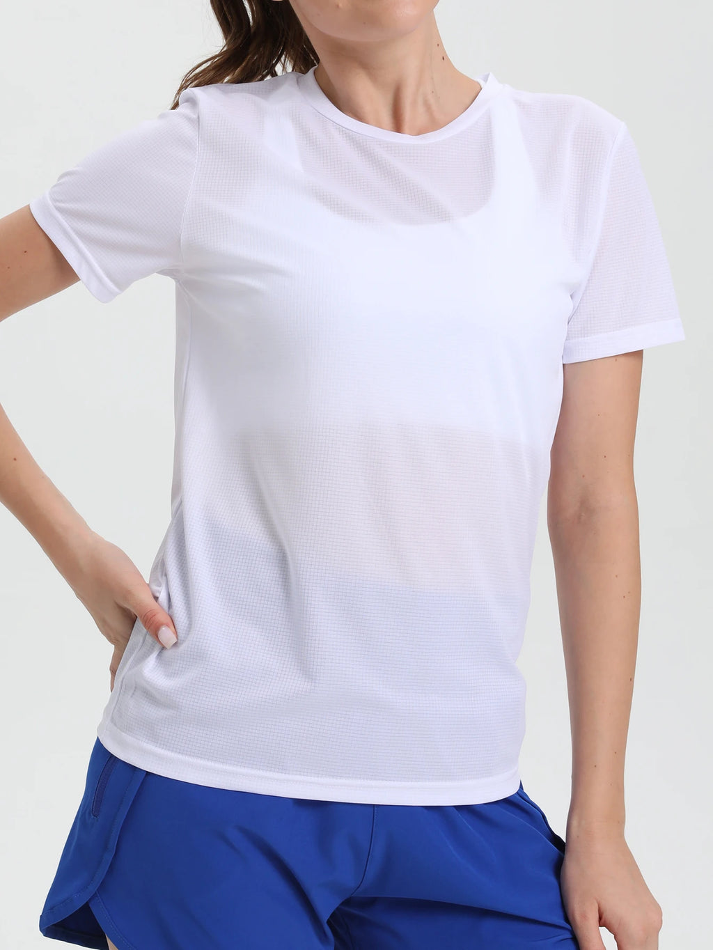 Camiseta esportiva feminina de cor sólida, ultraleve, de secagem rápida, respirável e leve, ideal para corrida e academia.