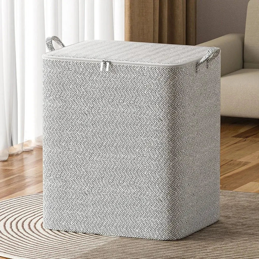 Saco de armazenamento para edredons em tecido com tampa e zíper, dobrável, para roupas e cobertores.