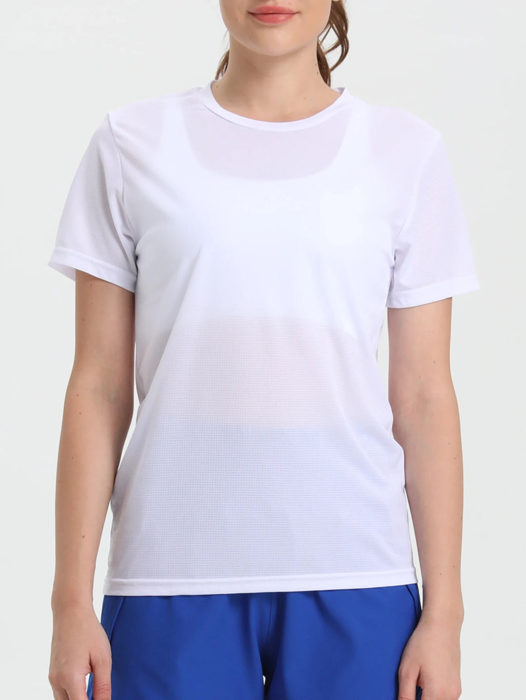 Camiseta esportiva feminina de cor sólida, ultraleve, de secagem rápida, respirável e leve, ideal para corrida e academia.