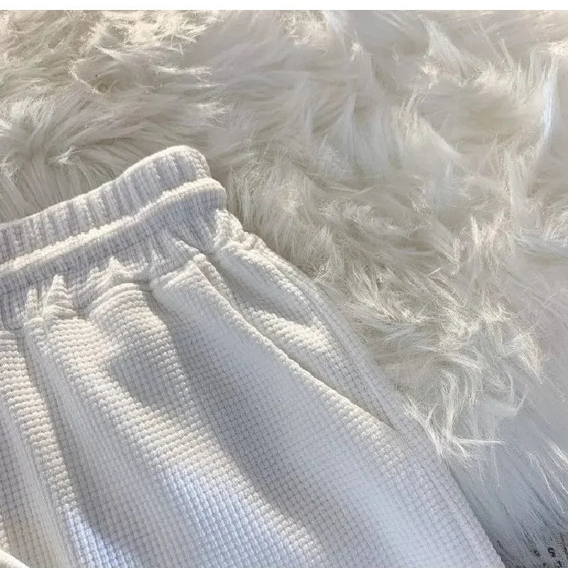 Shorts esportivos femininos confortáveis com textura waffle, ideais para lazer, ciclismo, camping, caminhadas e montanhismo.