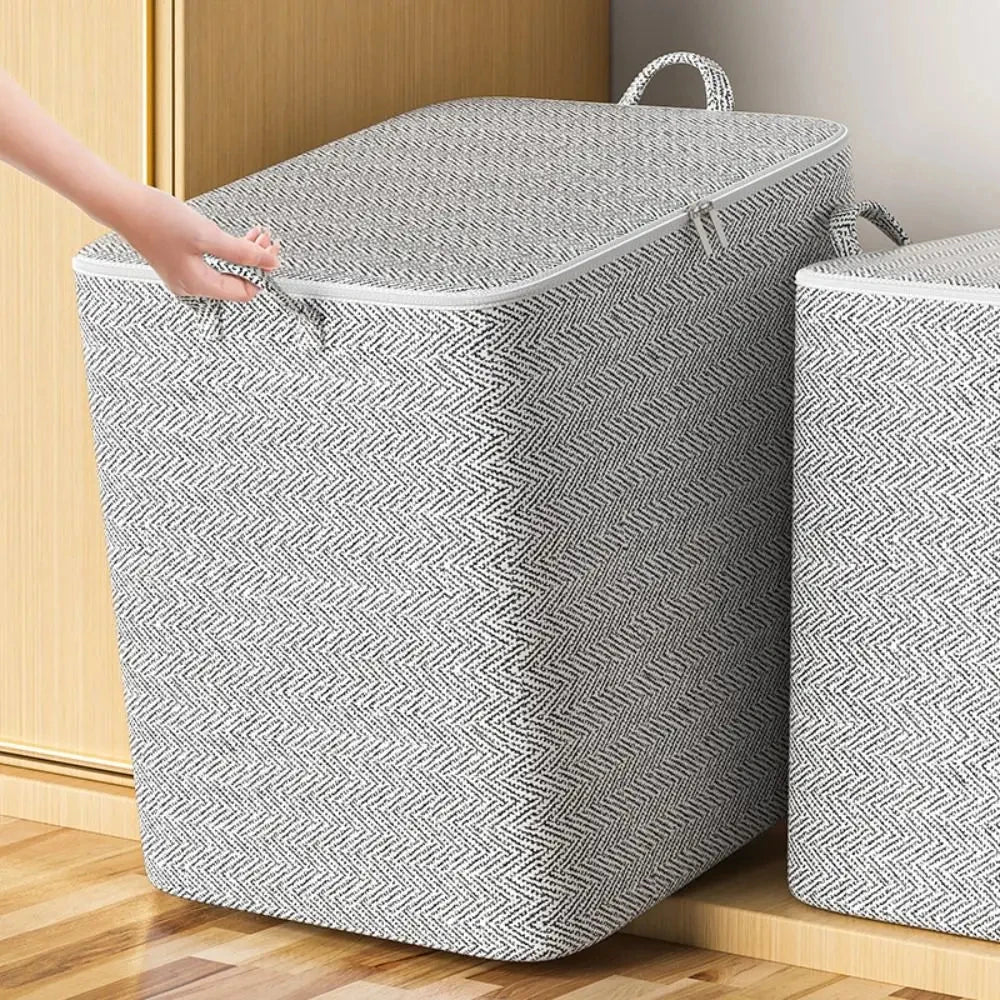 Saco de armazenamento para edredons em tecido com tampa e zíper, dobrável, para roupas e cobertores.