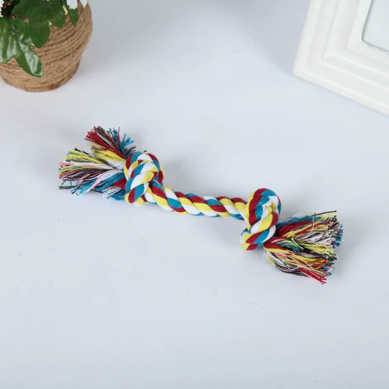 Colorful cotton double-knot dog toy, durable rope for chewing and teeth cleaning.