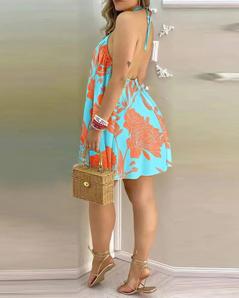 Vestido Boho com Estampa Floral e Decote Halter, Costas Nuas e Alças no Pescoço, Ideal para Primavera/Verão