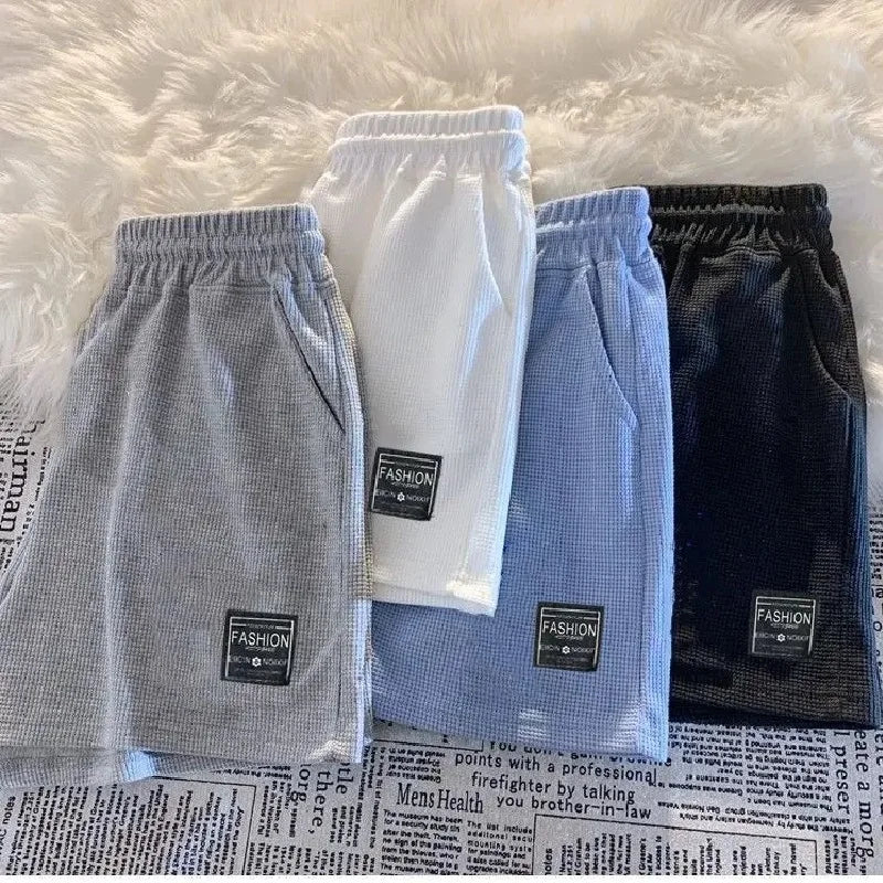 Shorts esportivos femininos confortáveis com textura waffle, ideais para lazer, ciclismo, camping, caminhadas e montanhismo.