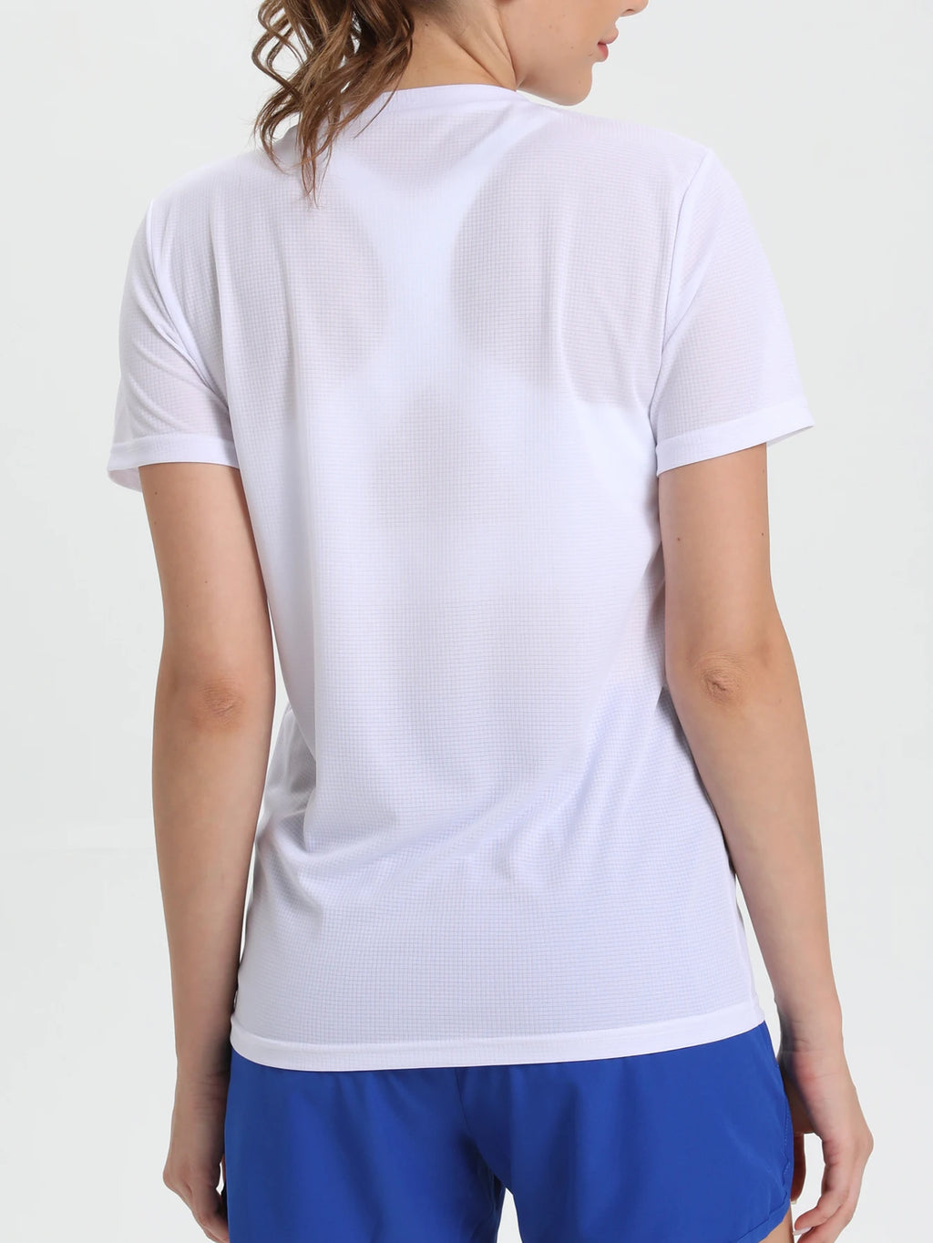 Camiseta esportiva feminina de cor sólida, ultraleve, de secagem rápida, respirável e leve, ideal para corrida e academia.