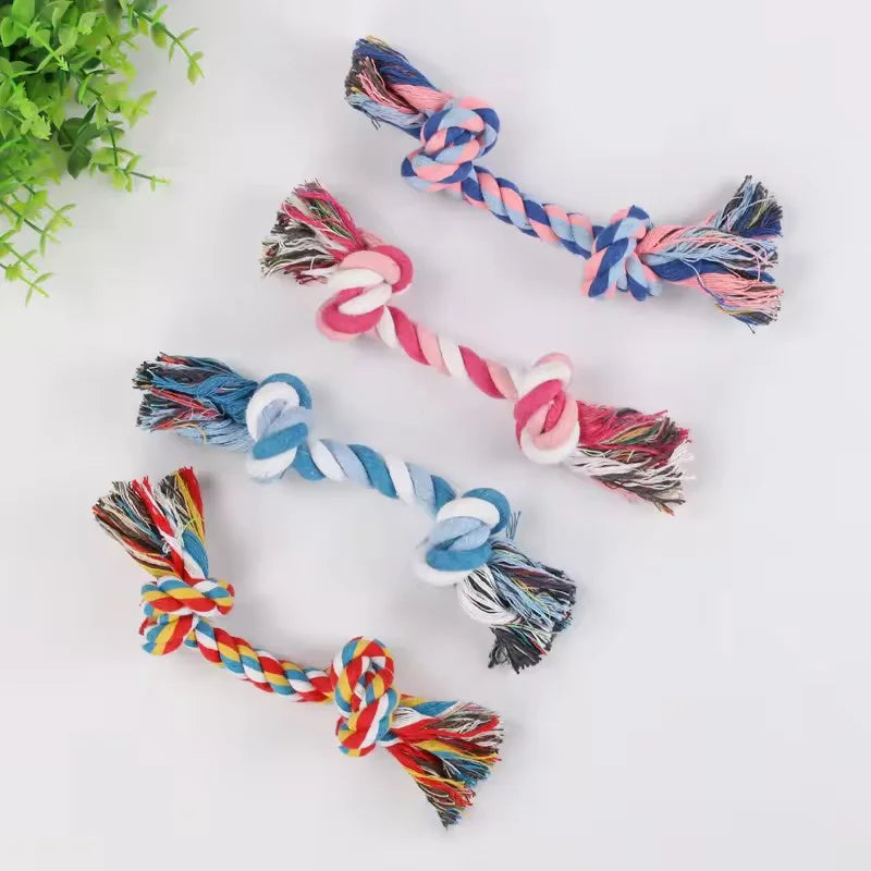 Colorful cotton double-knot dog toy, durable rope for chewing and teeth cleaning.