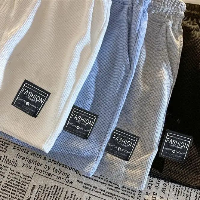 Shorts esportivos femininos confortáveis com textura waffle, ideais para lazer, ciclismo, camping, caminhadas e montanhismo.