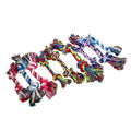 Colorful cotton double-knot dog toy, durable rope for chewing and teeth cleaning.